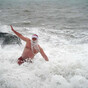 Photos: hardy souls brave the rain and cold and take to the sea for Christmas day swims