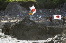 Protests across China after Japanese swimmers 'invade' disputed islands