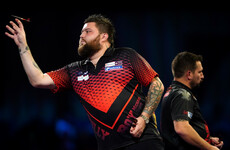 Michael Smith beats defending champion Gerwyn Price to book semi-final spot