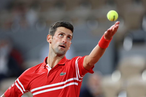 Djokovic serves during the French Open in 2021.