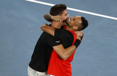 Nick Kyrgios lands first grand slam title by winning men’s doubles in Melbourne