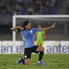 Suarez and Cavani on target to boost Uruguay World Cup hopes as Argentina defeat Colombia