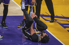 Lakers rally to beat Jazz after Davis hurt, Nuggets stun Warriors