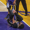 Lakers rally to beat Jazz after Davis hurt, Nuggets stun Warriors