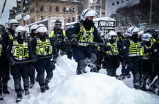 More than 100 arrested as Canadian police crack down on Ottawa trucker protest
