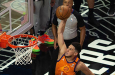 Booker stars as Suns beat Heat to seal NBA playoff berth