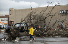 One person killed and more than a dozen injured after tornadoes hit parts of the US
