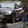 Why did the Mexican police shoot at a US government vehicle?