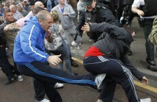In pictures: violence erupts during Belfast parades