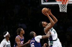 Record-setting Giannis lifts Bucks over Nets