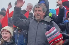 Celebrations as Charlie Bird reaches top of Croagh Patrick alongside family and supporters