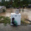 Isaac's death toll rises to nine as storm moves towards US