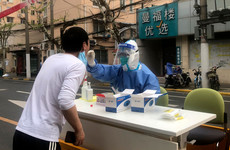 Shutdowns spread in China as Covid infections rise