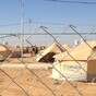 Minister visits refugee camp in Jordan as Syrian rebels 'shoot down' helicopter in Damascus