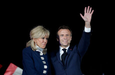 Macron pledges to reunite divided France after winning second presidential term