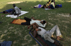 Early heatwave hits India and Pakistan as temperatures hit 45C causing rubbish dumps to burn