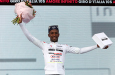 History-making Girmay taken to hospital as champagne cork mars Giro win