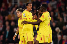 Under-strength Liverpool prevail to bring Premier League title race to final day