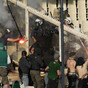 Fans fight with riot police as Panathinaikos win violence-marred Greek Cup final