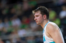 Doncic helps Mavs down Warriors to keep series alive