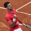 Djokovic overcomes French Open taunts to close in on Nadal's grand slam record