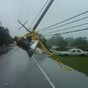 Isaac downgraded to tropical storm as curfew remains