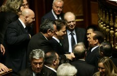Berlusconi scrapes through parliament confidence vote