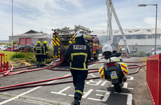 One woman brought to hospital following fire at factory in Carlow