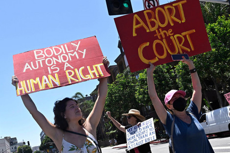 Activists march through Los Angeles in protest against the US Supreme Court’s ruling on abortion.