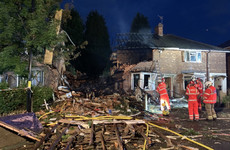 Locals rescue man from house after suspected gas explosion that killed woman