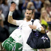 Andy Murray knocked out of Wimbledon by big-serving John Isner
