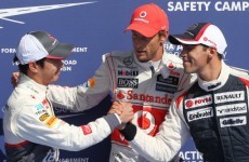 Button claims his first pole for McLaren in Belgium