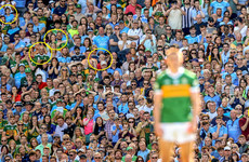 The stories behind this iconic photo of Sean O'Shea's match-winning free