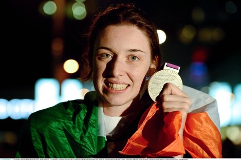 Ireland's Helen Kearney, from Dunlavin, Co. Wicklow, celebrates with her silver medal for individual championship test - grade 1a. 