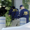 Suspect who tried to breach FBI office in US city dies in stand-off