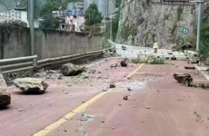 South-west China quake leaves 21 dead and triggers landslides