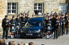 Man charged after Prince Andrew heckled during procession of queen's coffin in Scotland