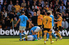 Nathan Collins sent off as Manchester City go top with Wolves win