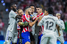 Rodrygo and Valverde on target as Real Madrid edge out heated derby to reclaim top spot