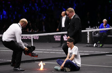Players stunned as protester sets arm on fire in dramatic incident at Laver Cup