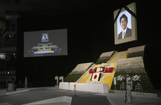 Japan honours Shinzo Abe at controversial funeral