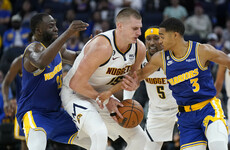 Jokic posts triple double as Nuggets stun Warriors