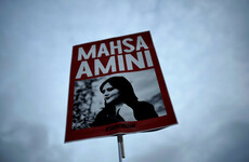 Iran security forces 'open fire' as thousands mourn Mahsa Amini