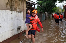 At least 47 dead and dozens feared missing as storm and floods lash Philippines