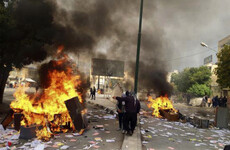 Iranian security forces take aim at protest buildings