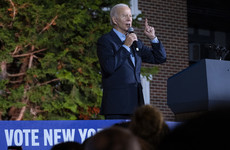 Biden and Trump clash on eve of US midterm election, as more than 40 million early ballots cast