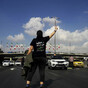 Iran charges 11 over killing of paramilitary member at ceremony for slain protester