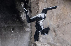 Banksy reveals artwork on side of damaged building in Ukraine
