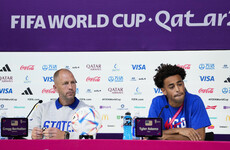 US coach apologises for Iranian flag furore in tense press conference