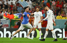 World Cup pitch invader with rainbow flag released and banned from future matches